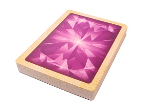 stack of game cards, with the cardback being a bright color of pink